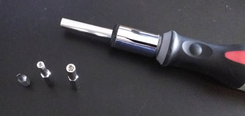 Ratcheting screwdriver with small flathead bit